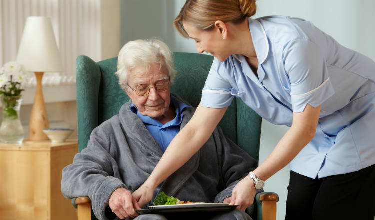 Nurse Helping Old Lady